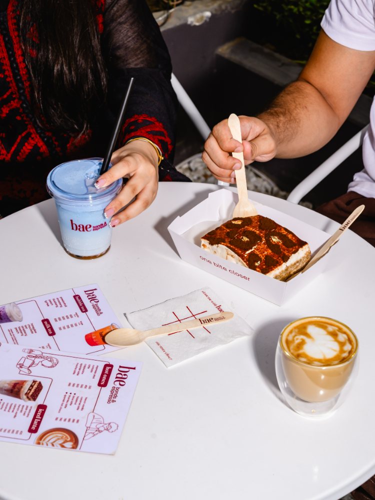 Sharing coffee and dessert at bae