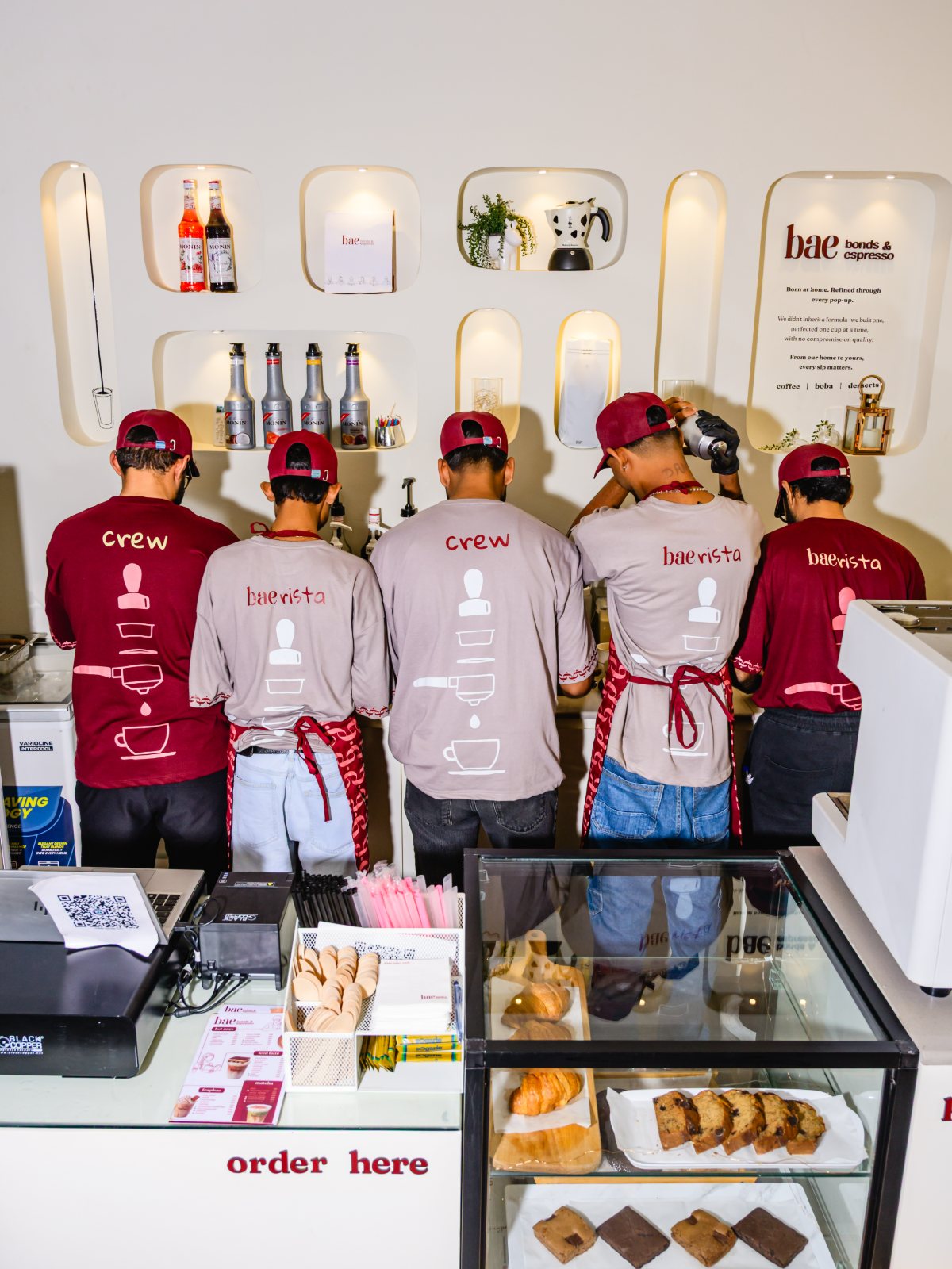 The bae team behind the counter